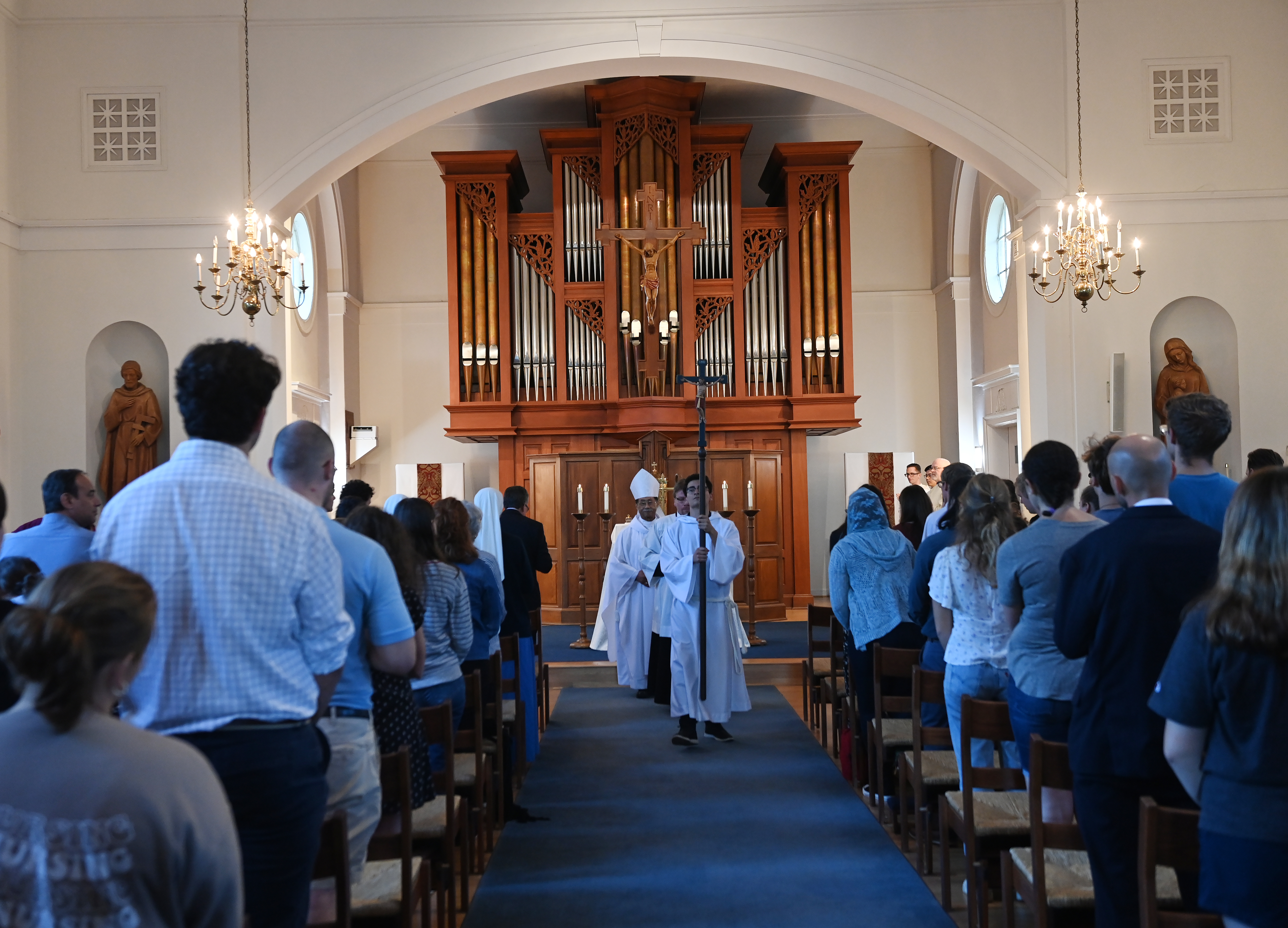 Male student receives his ring at ring blessing